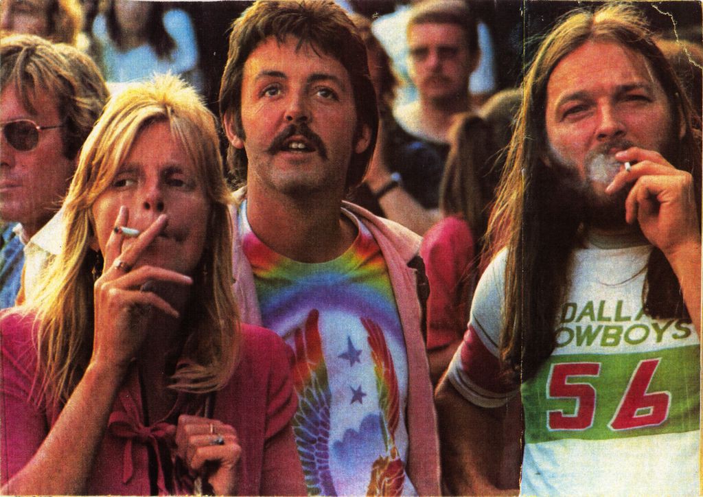 Photo of Linda McCartney, Paul McCartney and Pink Floyd’s David Gilmour taken at UK’s Knebworth Fair in 1976 which was headlined by The Rolling Stones 