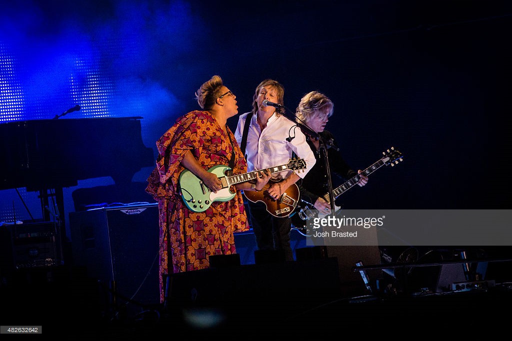 Brittany Howard (L) joins Paul McCartney (C) on stage at the 2015 Lollapalooza music festival at Grant Park on July 31, 2015 in Chicago, Illinois.