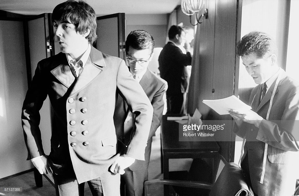 Paul McCartney  has his suit taken out by a tailor at the Tokyo Hilton during the  Beatles' Asian tour, 30th June 1966