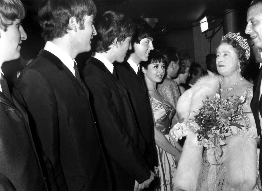 November 4, 1963: The Queen Mother talks to the Beatles after a Royal Variety Show at the Prince of Wales Theatre in London. George Freston / Fox Photos via Getty Images