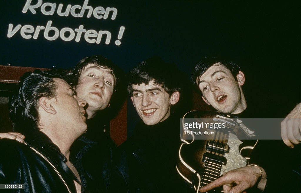 American rock and roll musician Gene Vincent (1935 - 1971) with The Beatles at the Star Club, Hamburg, April-May 1962. Left to right: Vincent, John Lennon (1940 - 1980), George Harrison (1943 - 2001) and Paul McCartney - Crédits : TS Productions