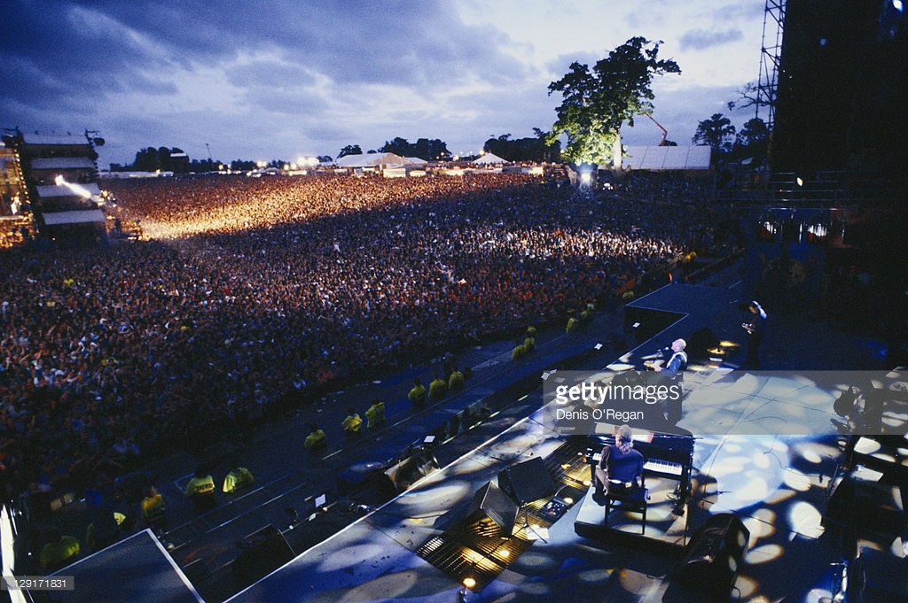 Paul McCartney performing at the Knebworth Festival, Hertfordshire, 30th June 1990 - Credits : Denis O'Regan