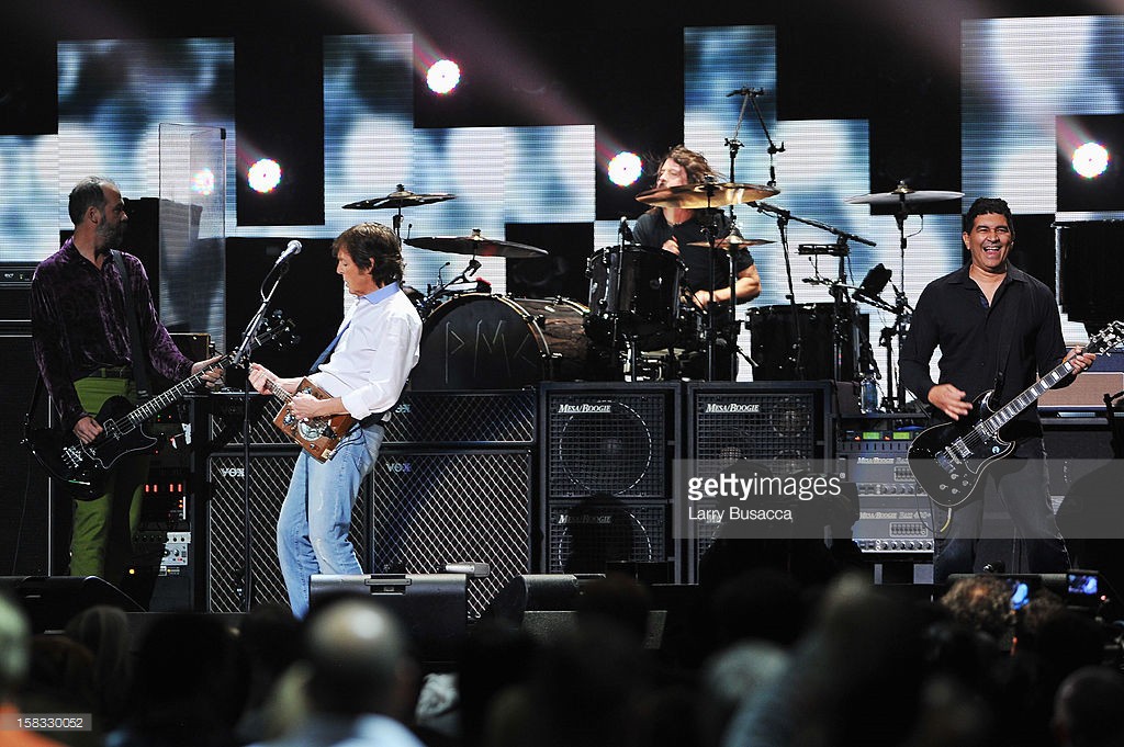 Krist Novoselic, Sir Paul McCartney, Dave Grohl, and Pat Smear perform at '12-12-12' a concert benefiting The Robin Hood Relief Fund to aid the victims of Hurricane Sandy presented by Clear Channel Media & Entertainment, The Madison Square Garden Company and The Weinstein Company at Madison Square Garden on December 12, 2012 in New York City.