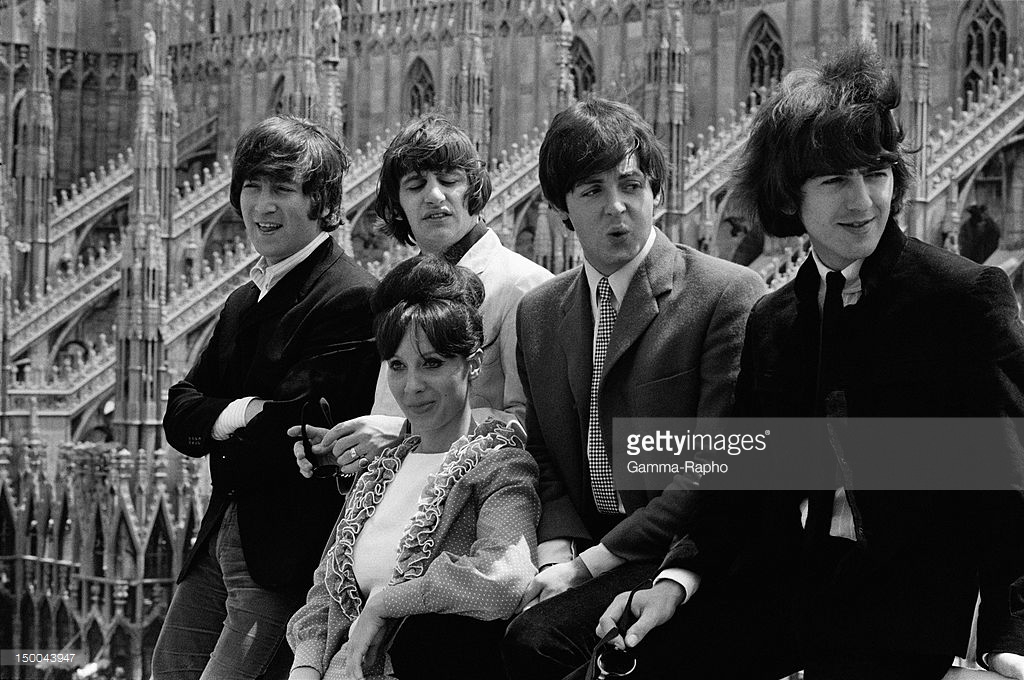 The Beatles on the rooftop of their hotel facing the Duomo on June 24, 1965 in Milan, Italy. - Credits: Reporters Associés