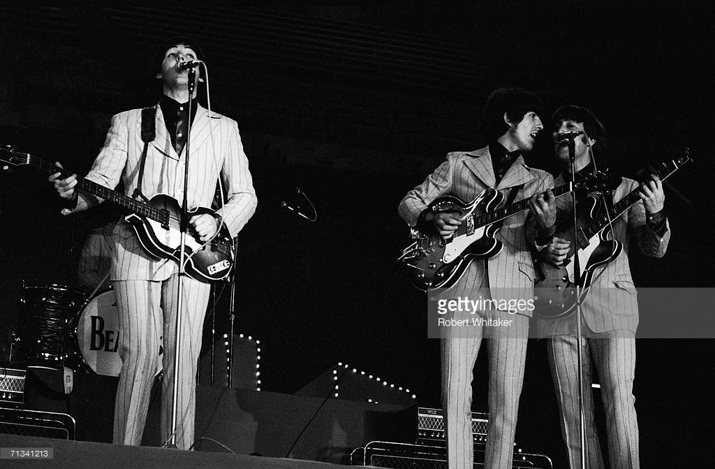 The Beatles on stage at Tokyo?s Budokan Hall, from left to right Paul McCartney, George Harrison and John Lennon, Japan, July 1st 1966 - Credits: Robert Whitaker