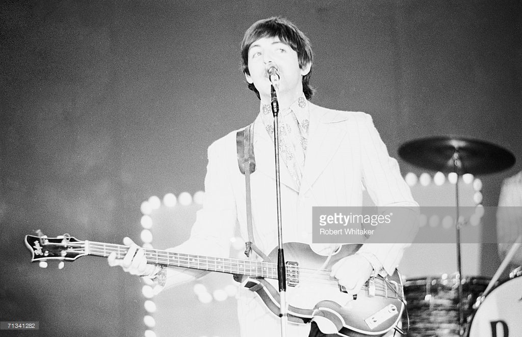 Paul McCartney on stage with the Beatles at Tokyo's Budokan Hall. Japan, 2nd July 1966 - Credit: Robert Whitaker