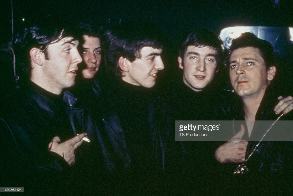 The Beatles with American rock and roll musician Gene Vincent (1935 - 1971) at the Star Club, Hamburg, April-May 1962. Left to right: Paul McCartney, original drummer Pete Best, George Harrison (1943 - 2001) John Lennon (1940 - 1980) and Vincent - Credits : TS Productions