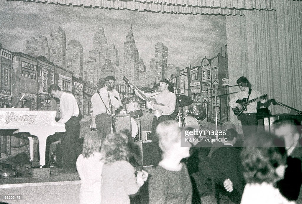 Photo of (L-R) guest pianist Roy Young performing with singer-guitarist John Lennon, drummer Pete Best, singer-bassist Paul McCartney and guitarist George Harrison, live onstage circa May 1962 at the Star-Club in Hamburg, Germany - Credits : K & K Ulf Kruger OHG